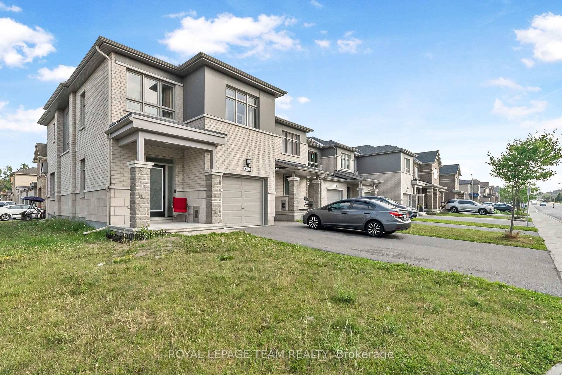 Welcome to this stunning end unit corner townhouse offering over 2, 000 sq.