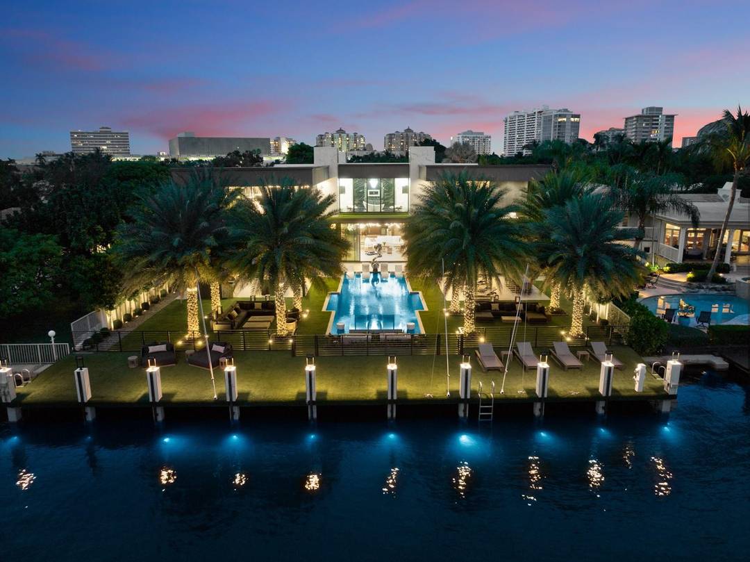 An unparalleled gated waterfront estate located on the deep waters of the Middle River nestled in a gated police patrolled community.