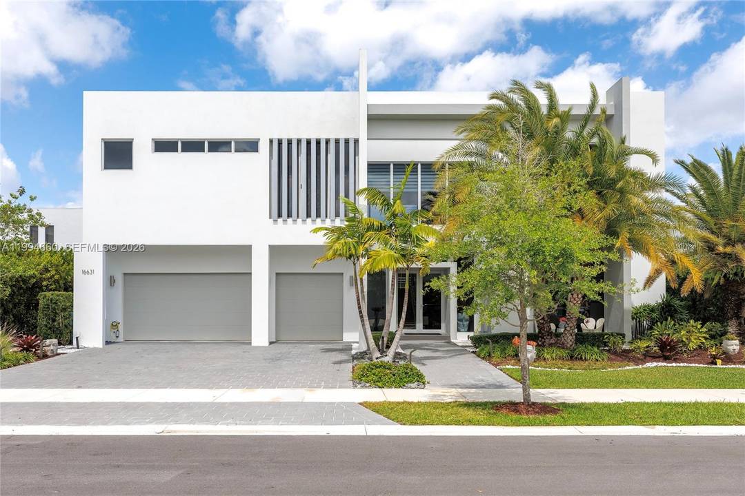 Spectacular modern lakefront estate in prestigious Botaniko Weston.