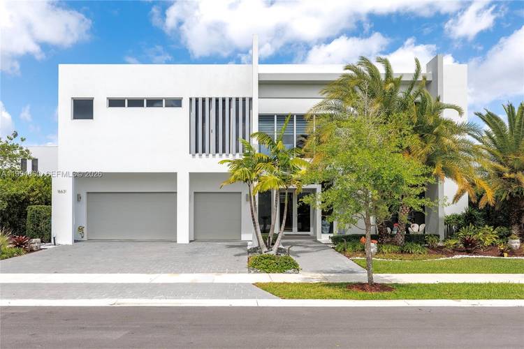 Spectacular modern lakefront estate in prestigious Botaniko Weston.