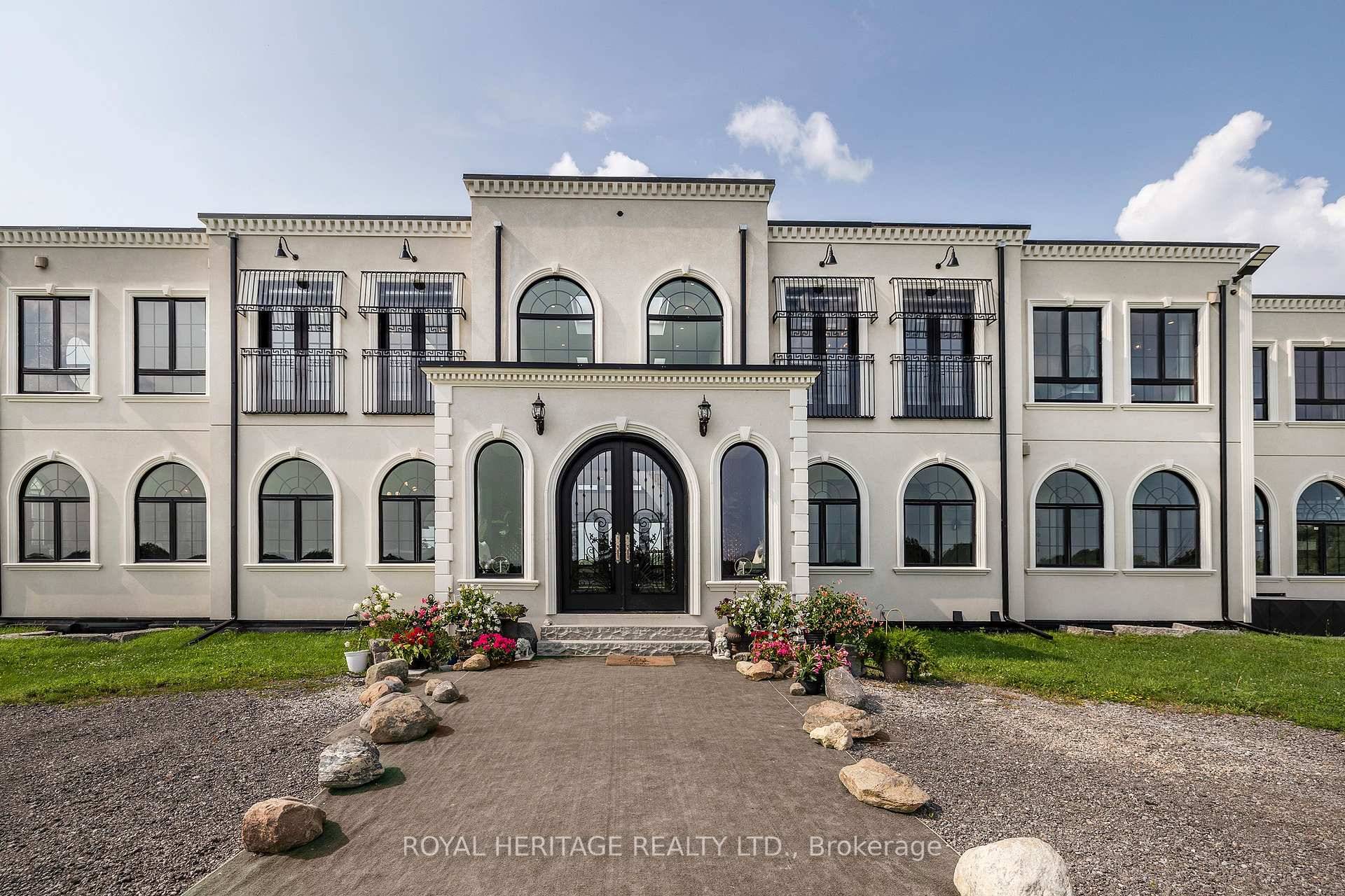 This magnificent Neo Classical Estate home blends the modern, conservative and progressive into a majestic home situated on 52 acres of natural beauty.