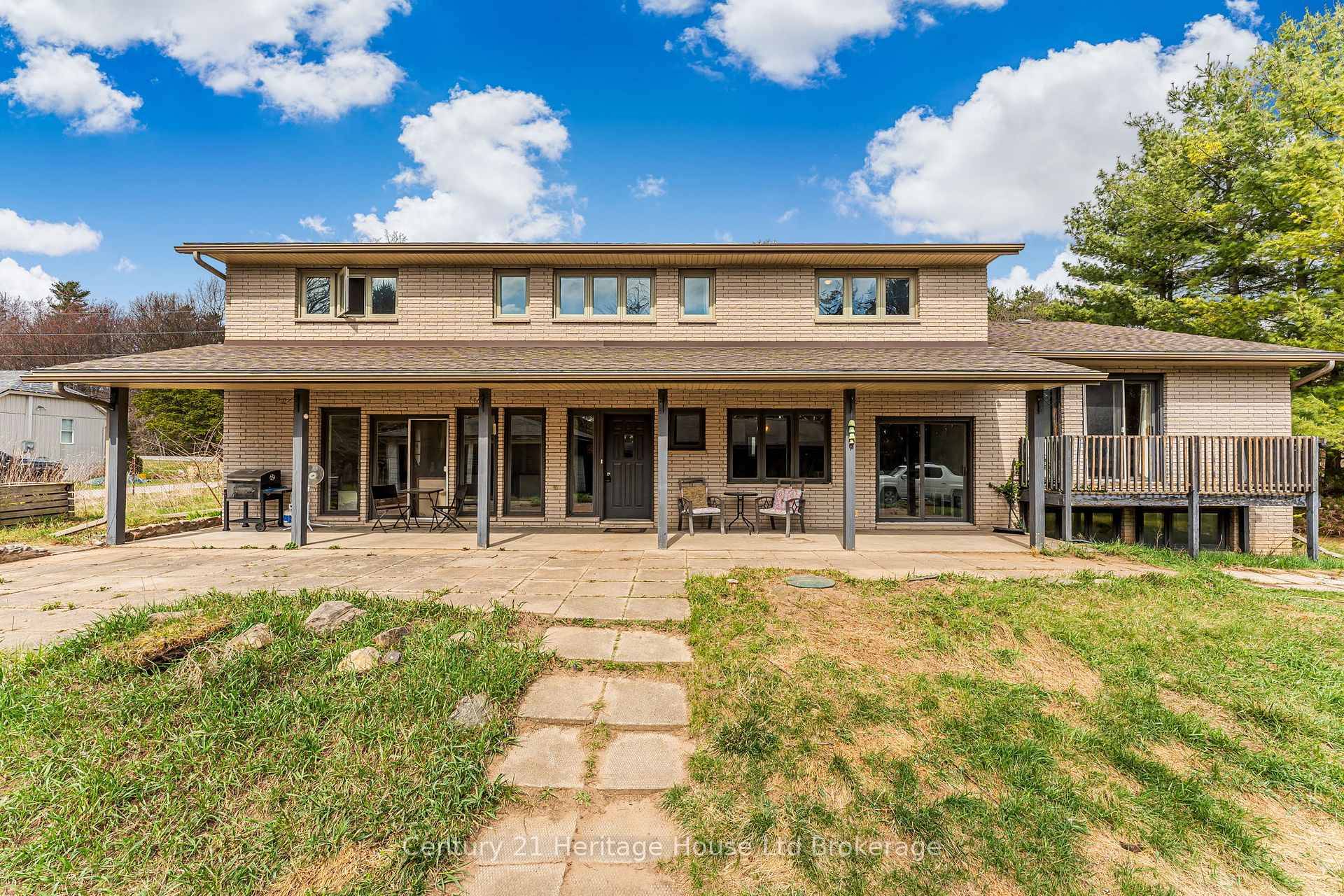 Welcome to 47 Norfolk County 59, Delhi an incredible 3, 100 sq ft above grade home situated on a private 1.