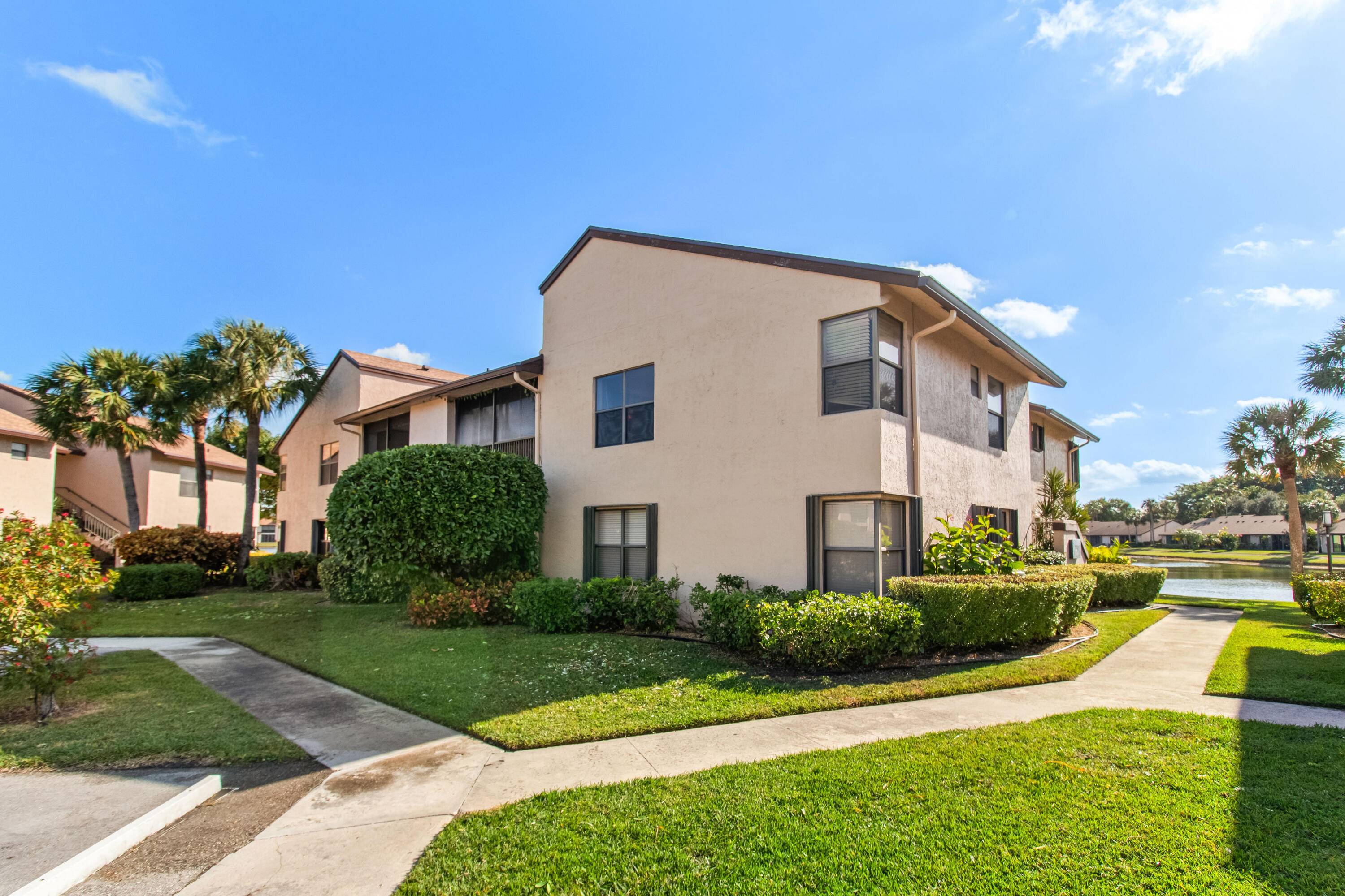 Welcome to this ready to move in 3 bed, 2 bath, first floor Condo located in Boca Glades !