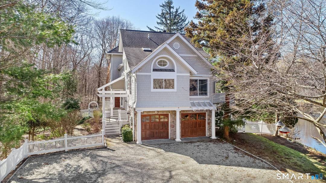 Completely rebuilt from the studs in 2008, this one of a kind Contemporary blends sleek modern design with classic New England exterior charm.