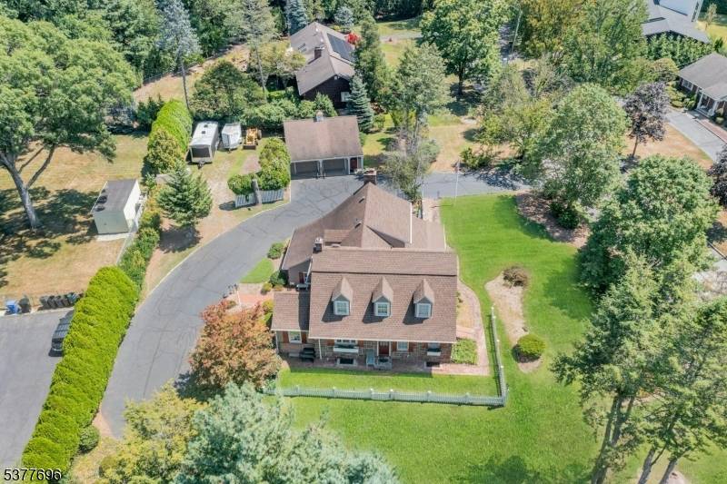 ELEGANT INVITING ! This CHARMING 1932 DUTCH COLONIAL home evokes a sense of nostalgia, set on a picturesque.