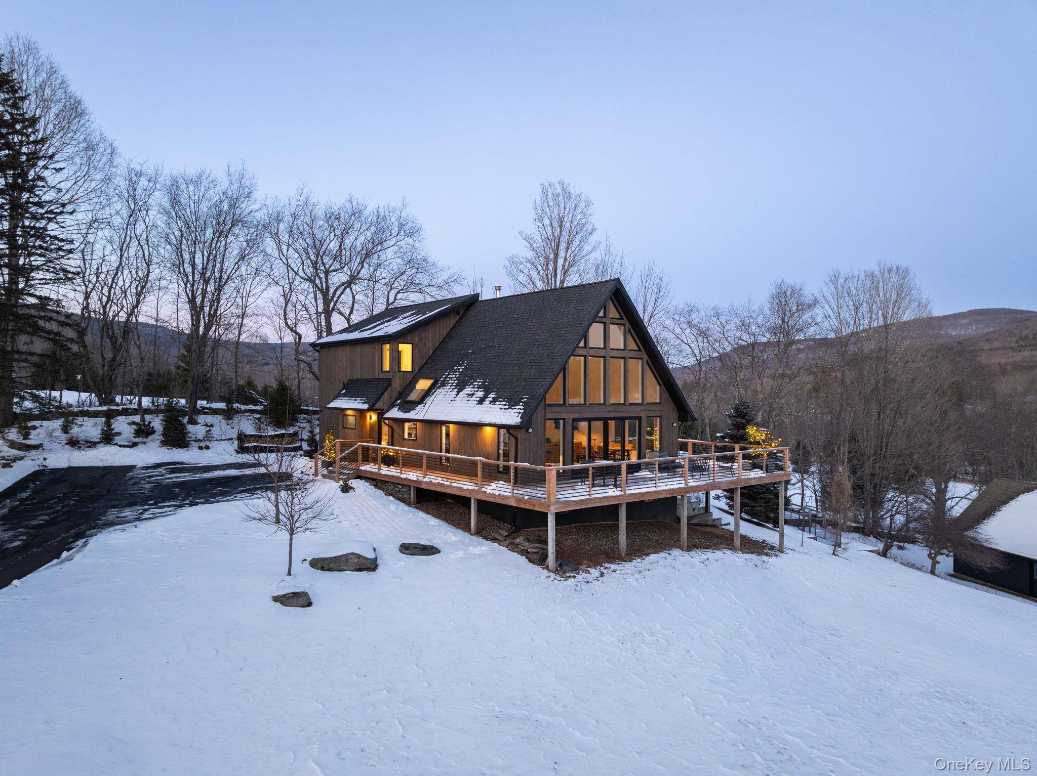 Welcome to FieldHouse 206 a stunning Catskills retreat where modern style meets serene natural beauty.