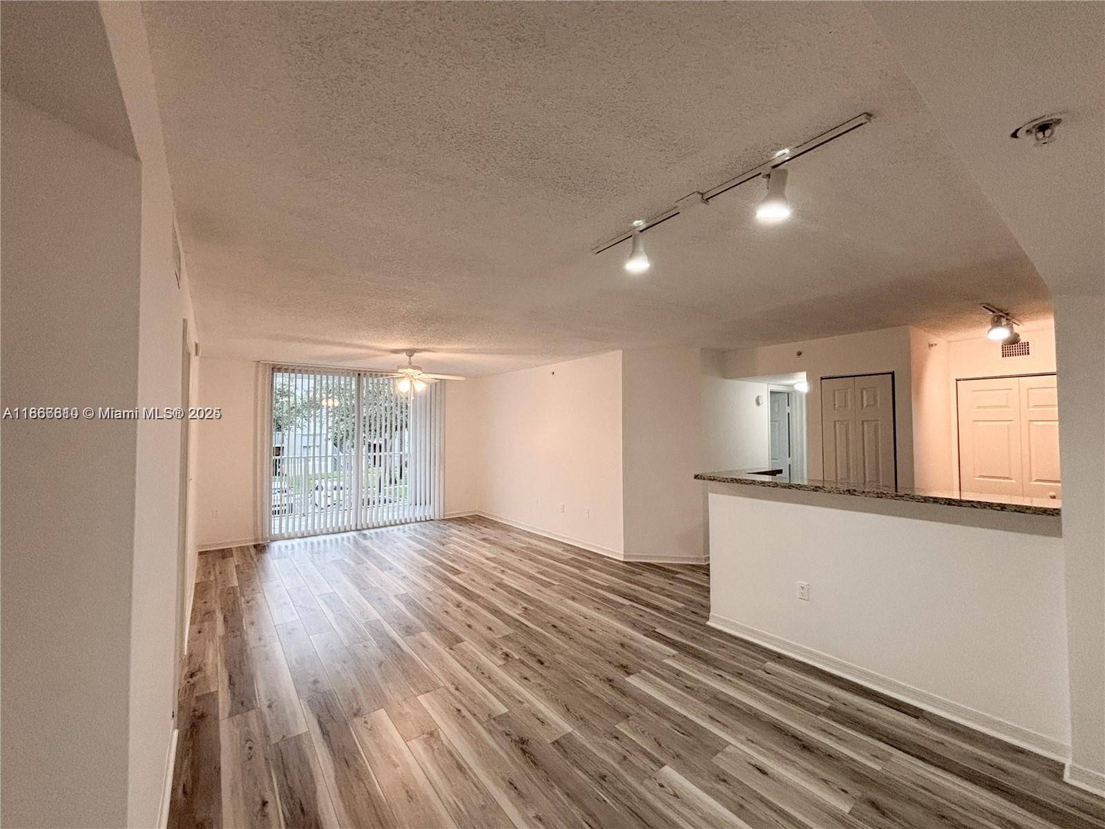 LOCATION ! LOCATION ! Welcome to this spacious 3 2 FULL bath condo located in the luxury community of Devonaire in Pembroke Pines.