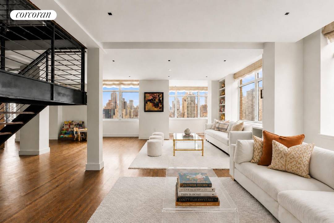 Expansive 4 Bedroom Duplex with Home Office 5th Bedroom and Panoramic Skyline Views This exceptional 4 or 5 bedroom, 3.
