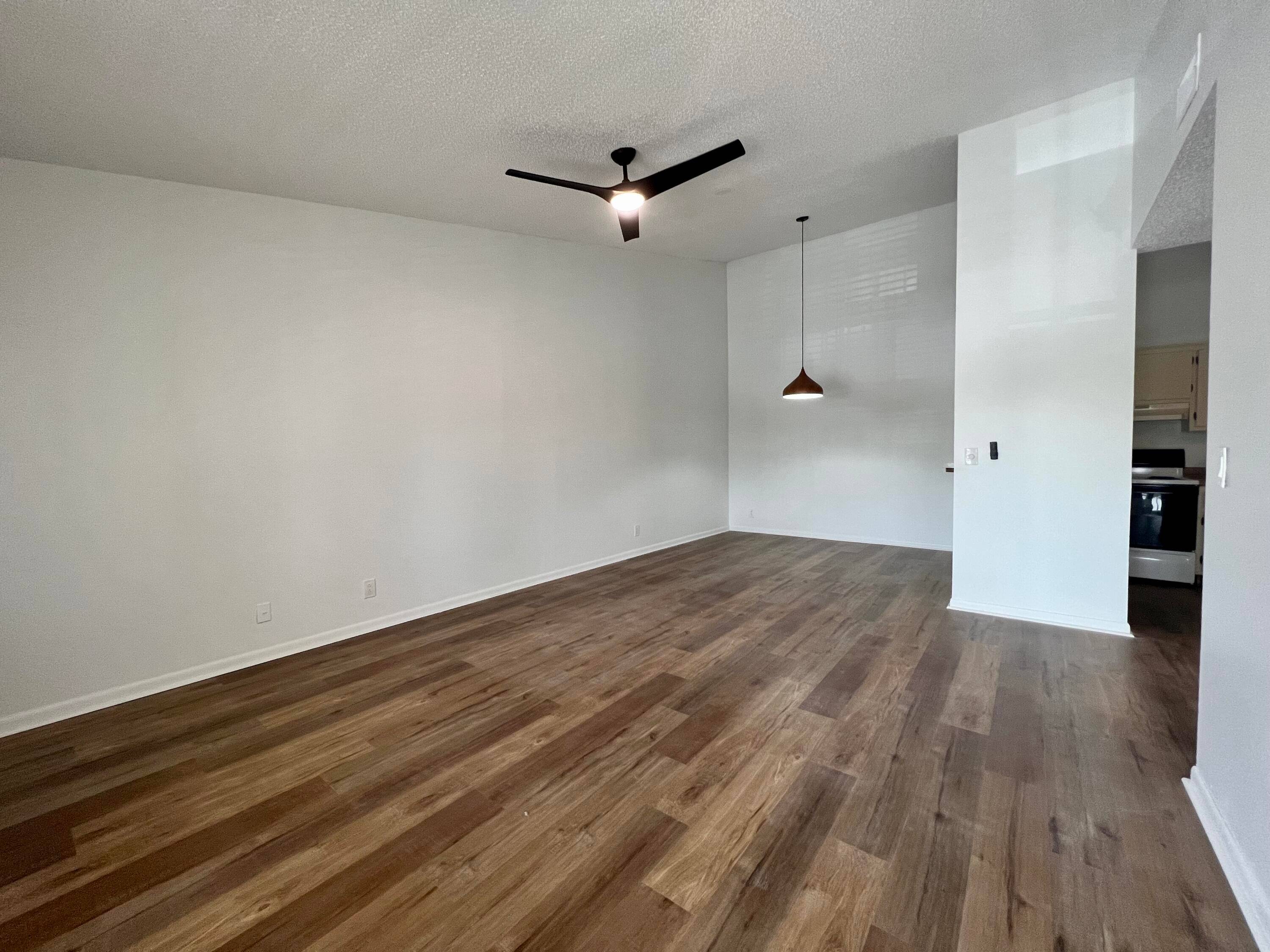 Experience the charm of this beautifully renovated two bedroom, two bath condominium in the sought after community of Chasewood of Jupiter.