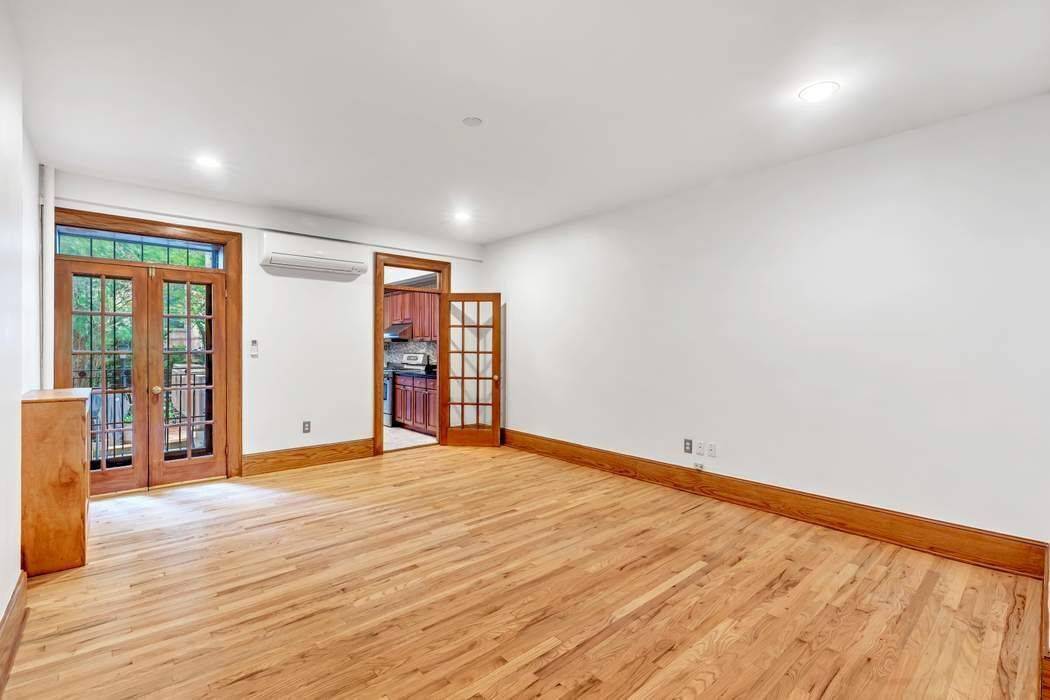 Absolutely gorgeous owner's duplex apartment with sunny private garden just moments from Central Park West.