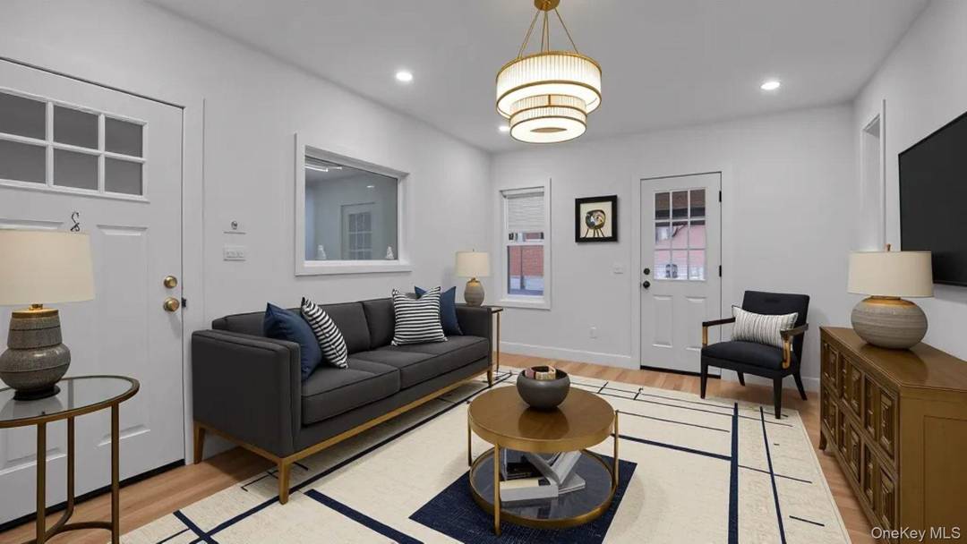 VIRTUAL STAGING, NOT REAL PROPERTY PHOTOS Welcome to 679 E 221st Street, a spacious two family home located in the heart of Olinville.