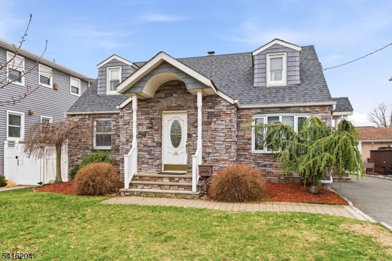 Beautiful stone front Cape ideally located just one block from the NYC bus, offering an exceptional commuter lifestyle with easy access to NJ Transit 2 miles and the PATH 3 ...