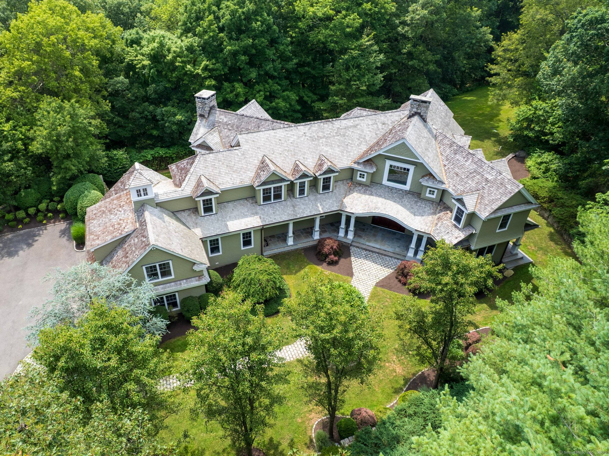 A rare opportunity to own a custom designed residence by renowned architect Peter Cadoux, nestled on a private cul de sac abutting Quarry Head Park Harrison Smith Preserve providing direct ...