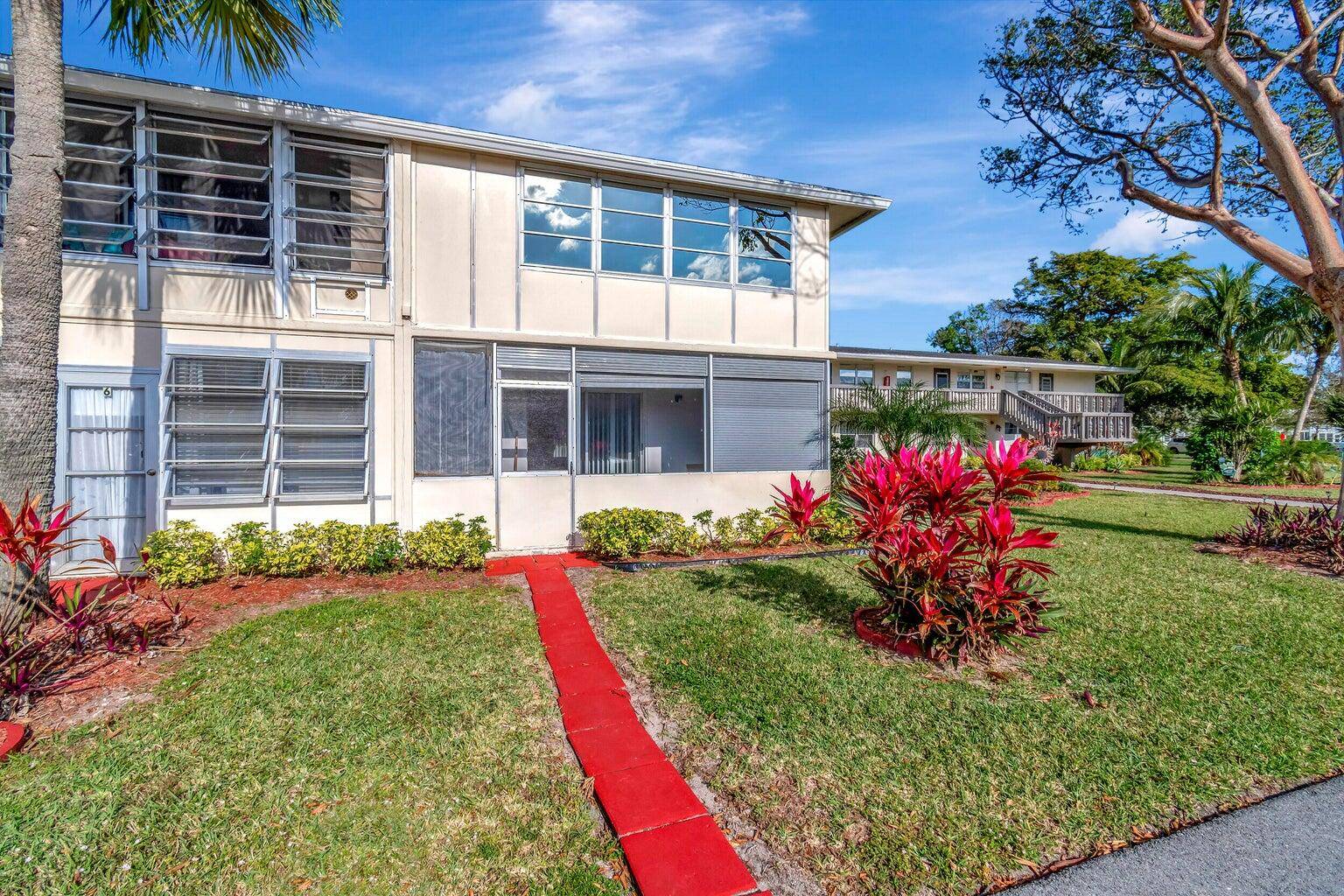 Don't miss seeing this light and bright ground floor corner unit !