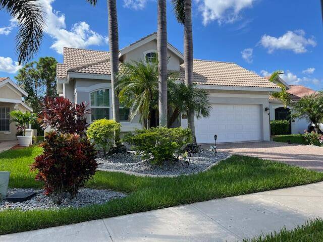 So many extras... impact, tinted windows sliding doors, solar energy system, updated kitchen with granite countertops, backsplash, pantry, stainless appliances, breakfast nook.