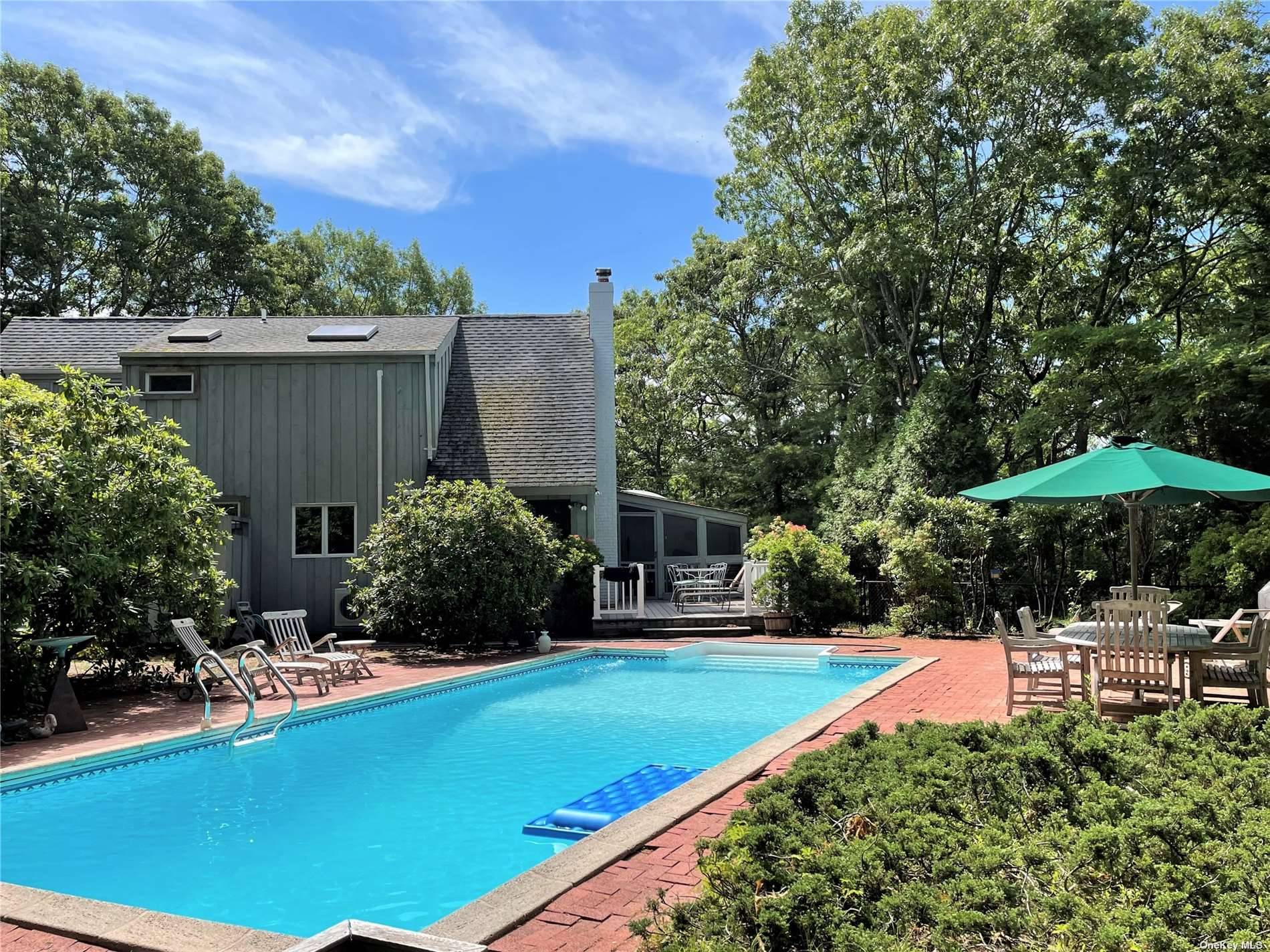 Move right in or just expand and turn this privately situated home on an elevated landscaped 0.