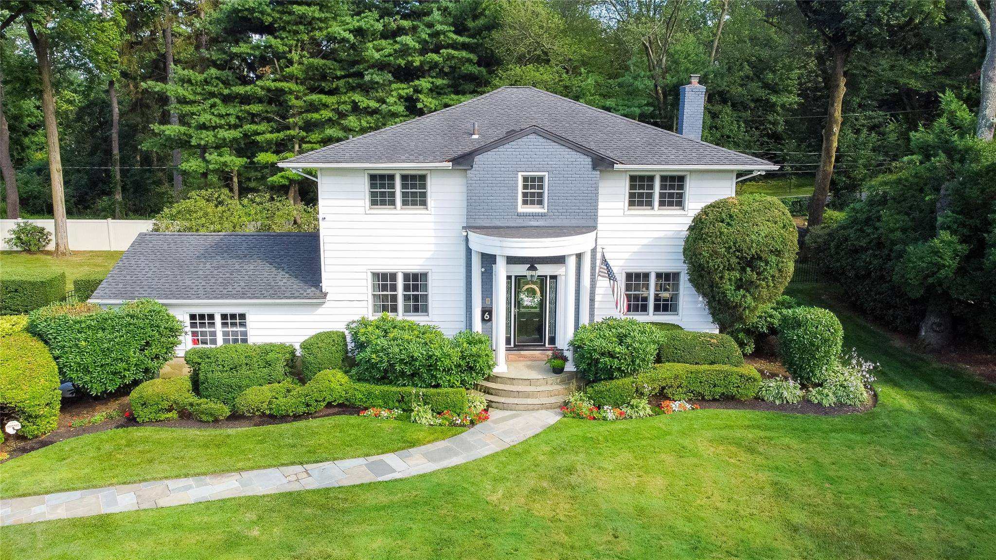 Welcome to this expansive, fully renovated home tucked away on a quiet cul de sac in the coveted Great Neck South school district.