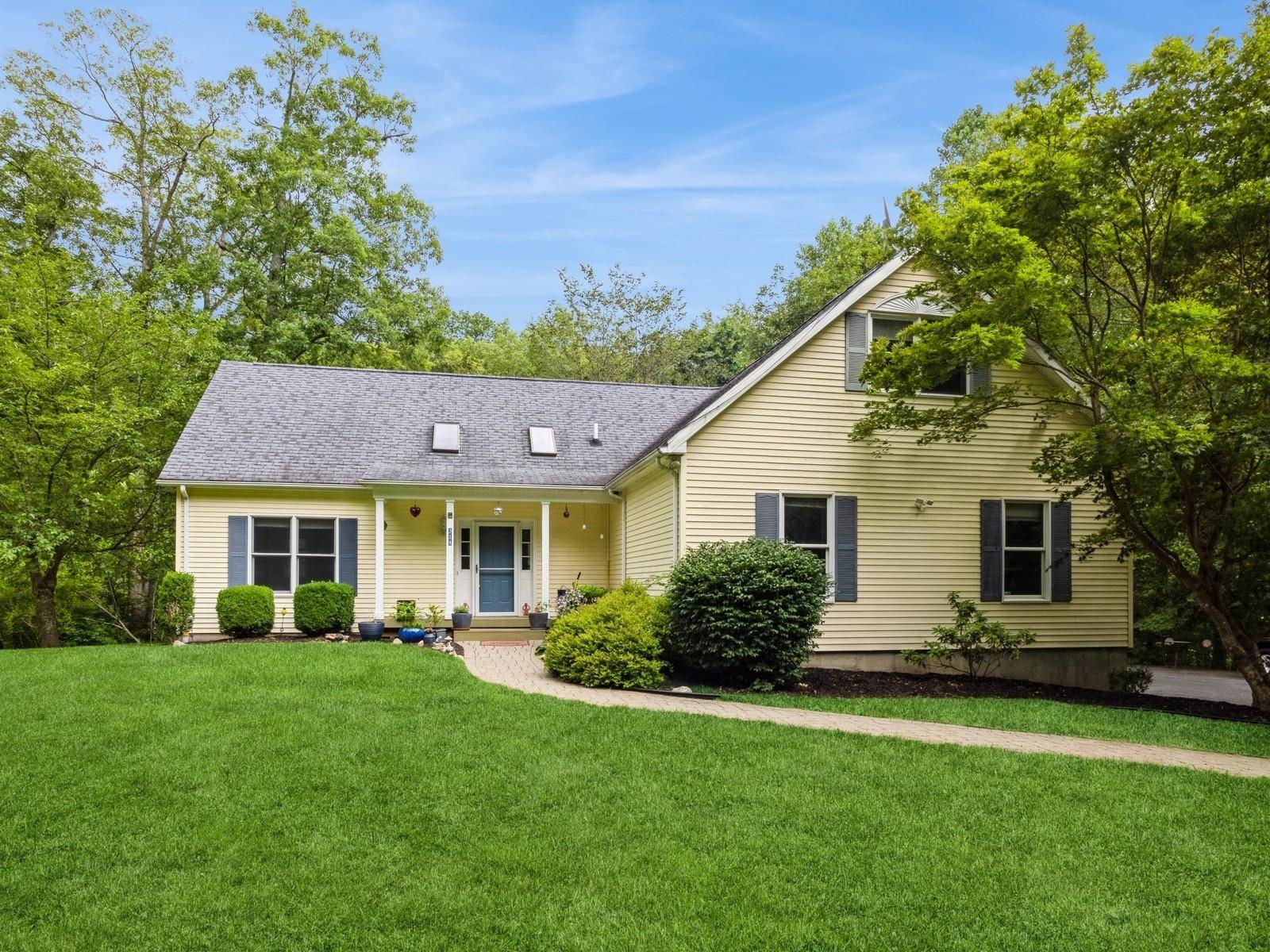 Enjoy country living in this Cape Cod custom built contemporary Garrison School District Must See !