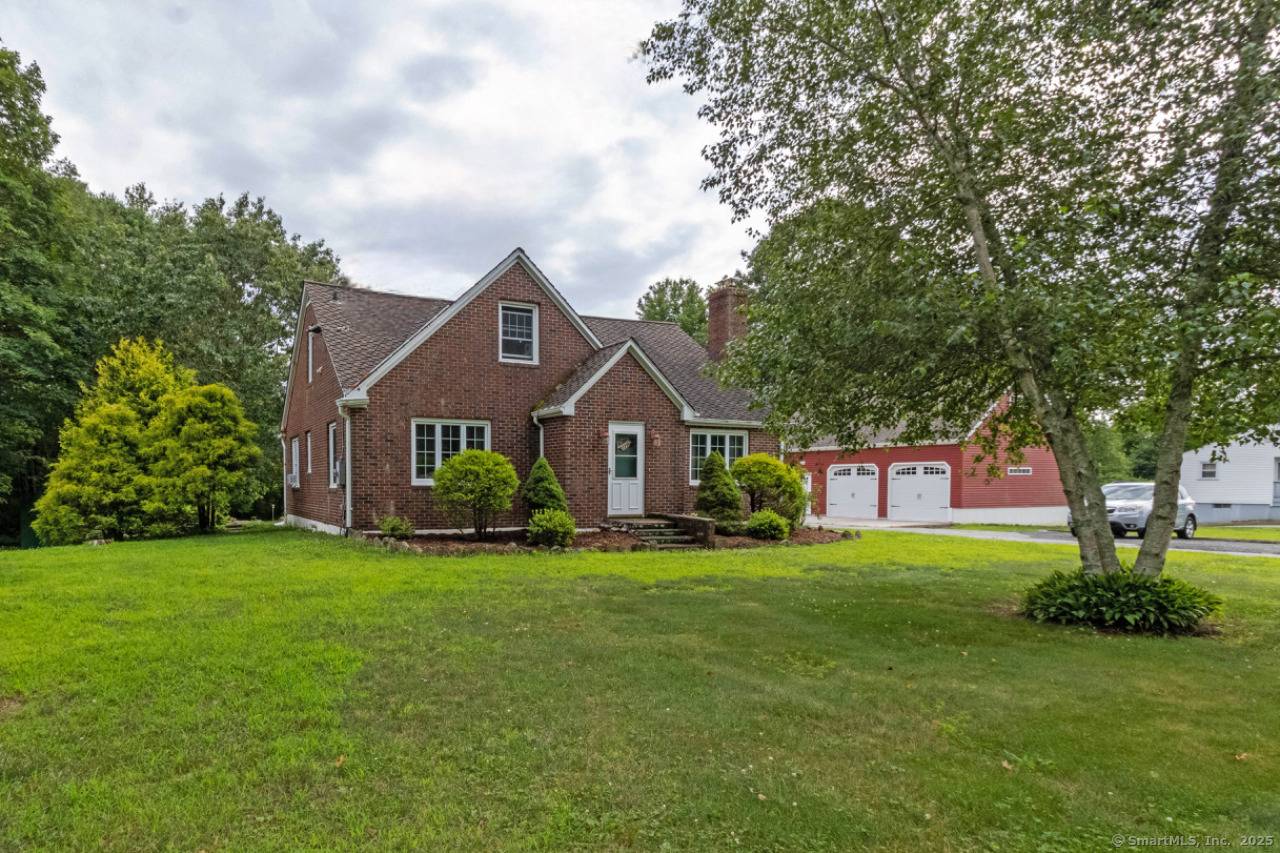 Welcome to this beautifully maintained brick Cape Cod home with modern updates and classic character.