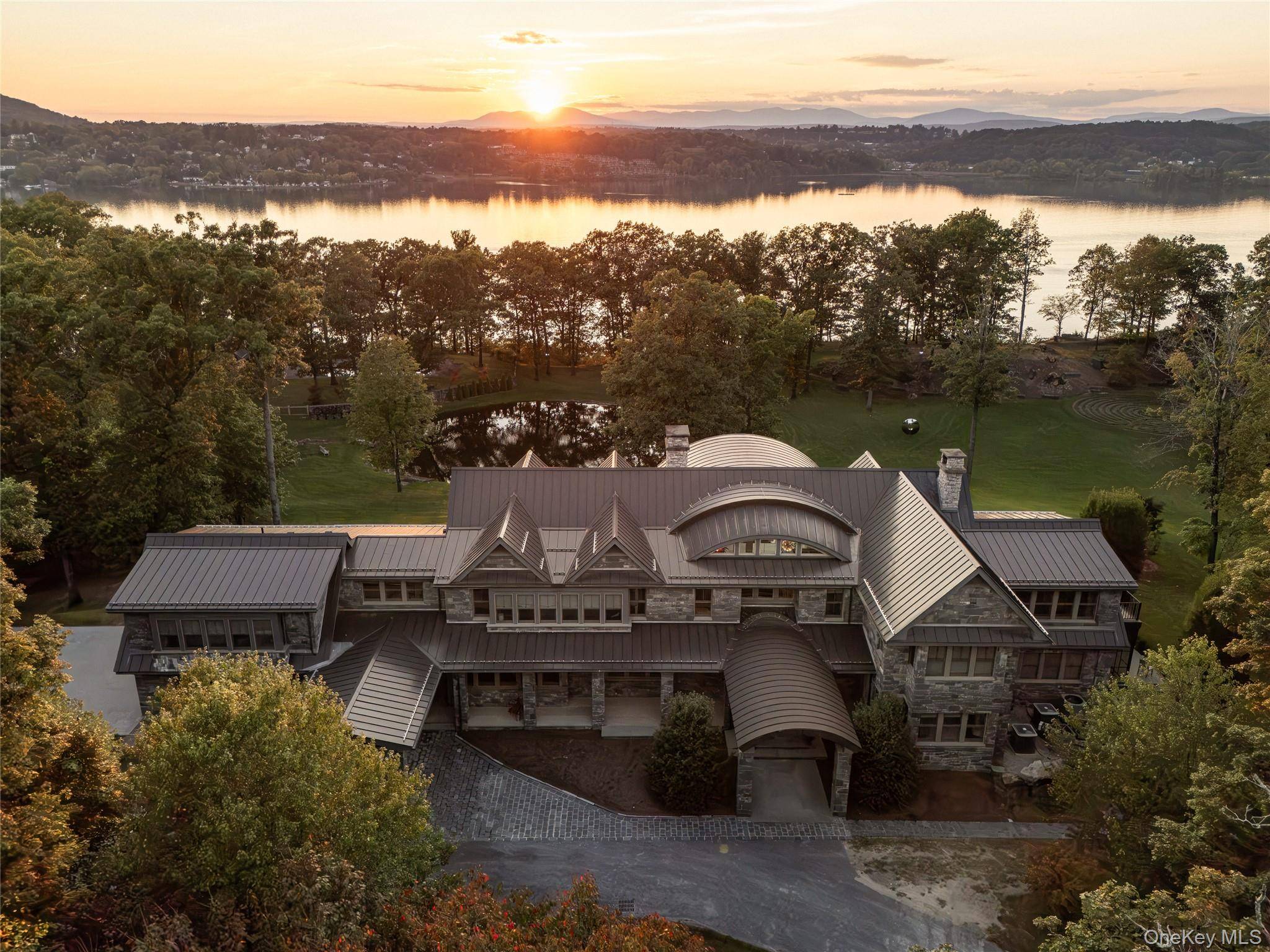 Stonecrest on the Hudson is a stunningly designed home on 16 inspiringly landscaped acres with extensive views of the river and the Catskills.
