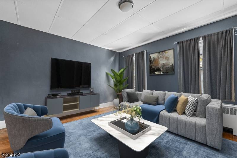 In the heart of Paulus Hook, this four level multi family blends urban lifestyle with serene waterfront living.