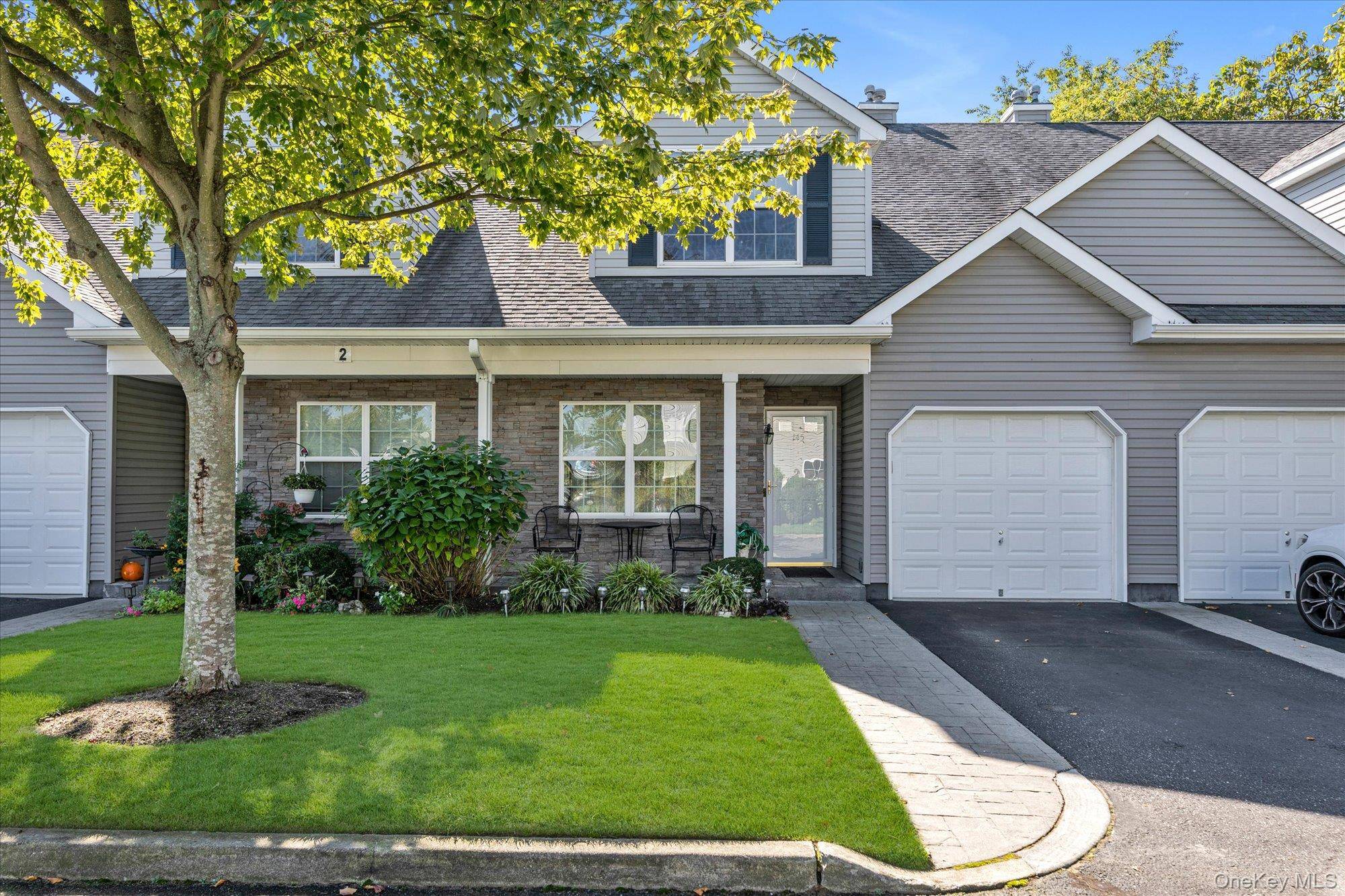 Discover comfort, convenience, and elegance in this beautifully appointed Sierra model townhouse nestled within the sought after Islip Landing 55 community.