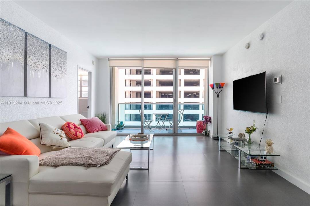 Step inside this turnkey, fully furnished oceanfront condo with direct beach access and breathtaking tropical views.