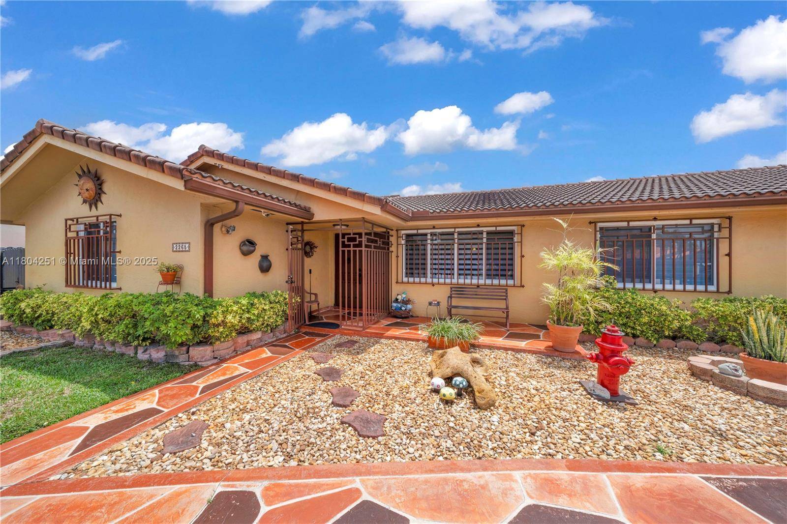 Tucked away on a quiet cul de sac in the heart of Miami, this well kept 3 bedroom, 2 bathroom home offers comfort, space, and versatility.