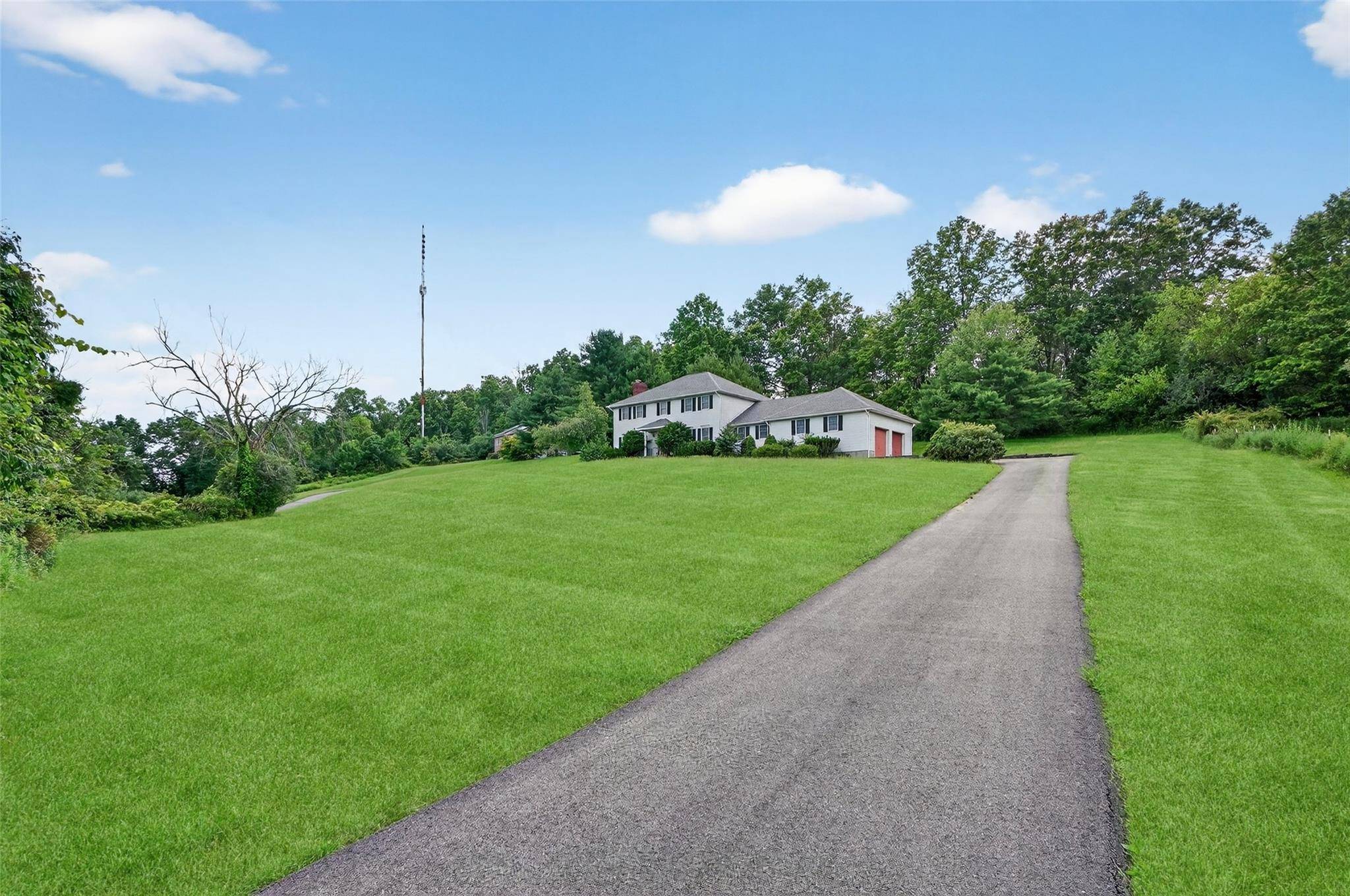 This expansive Colonial home offers over 3, 200 sq ft of beautifully maintained living space, nestled on a peaceful 1.