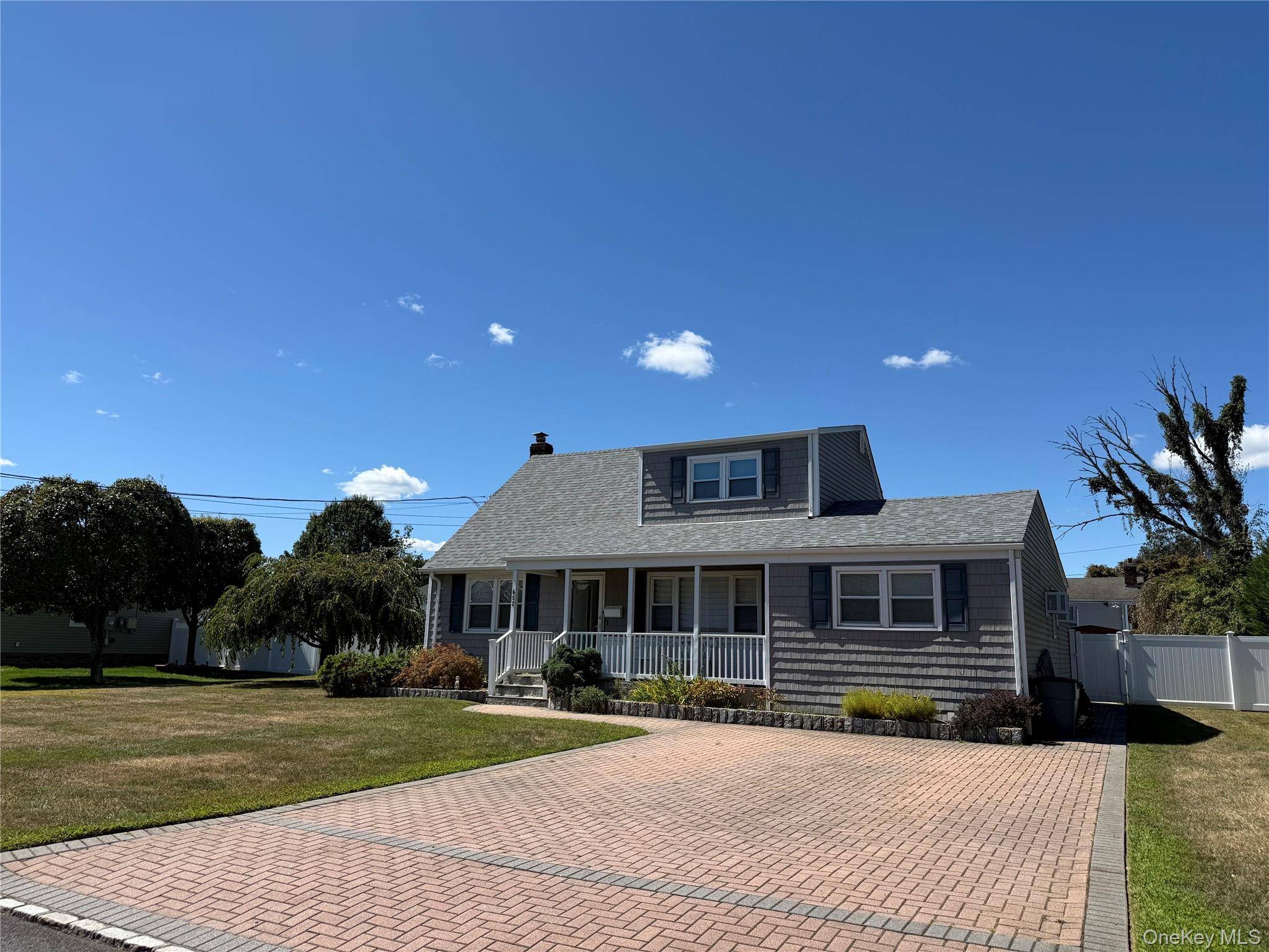 Welcome Home to this Large and bright expanded Cape style house.