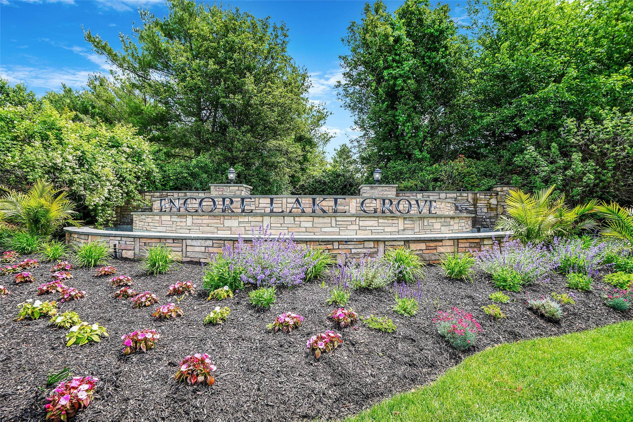 Encore Lake Grove is a luxury 55 active lifestyle condominium community.
