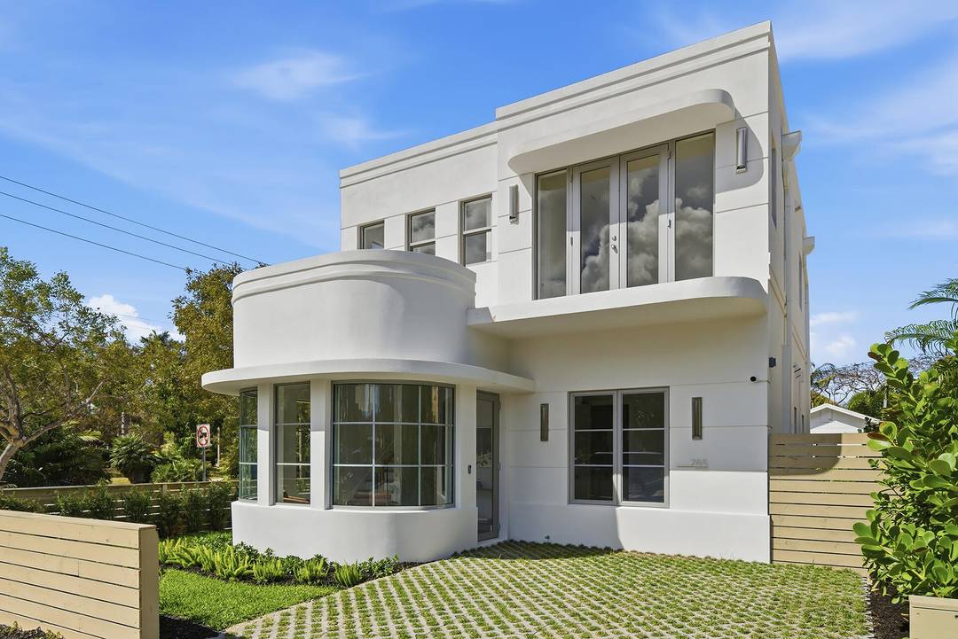 Tucked in the heart of historic Grandview Heights, this striking brand new Art Deco residence blends architectural character with warm modern living just moments from downtown West Palm Beach in ...