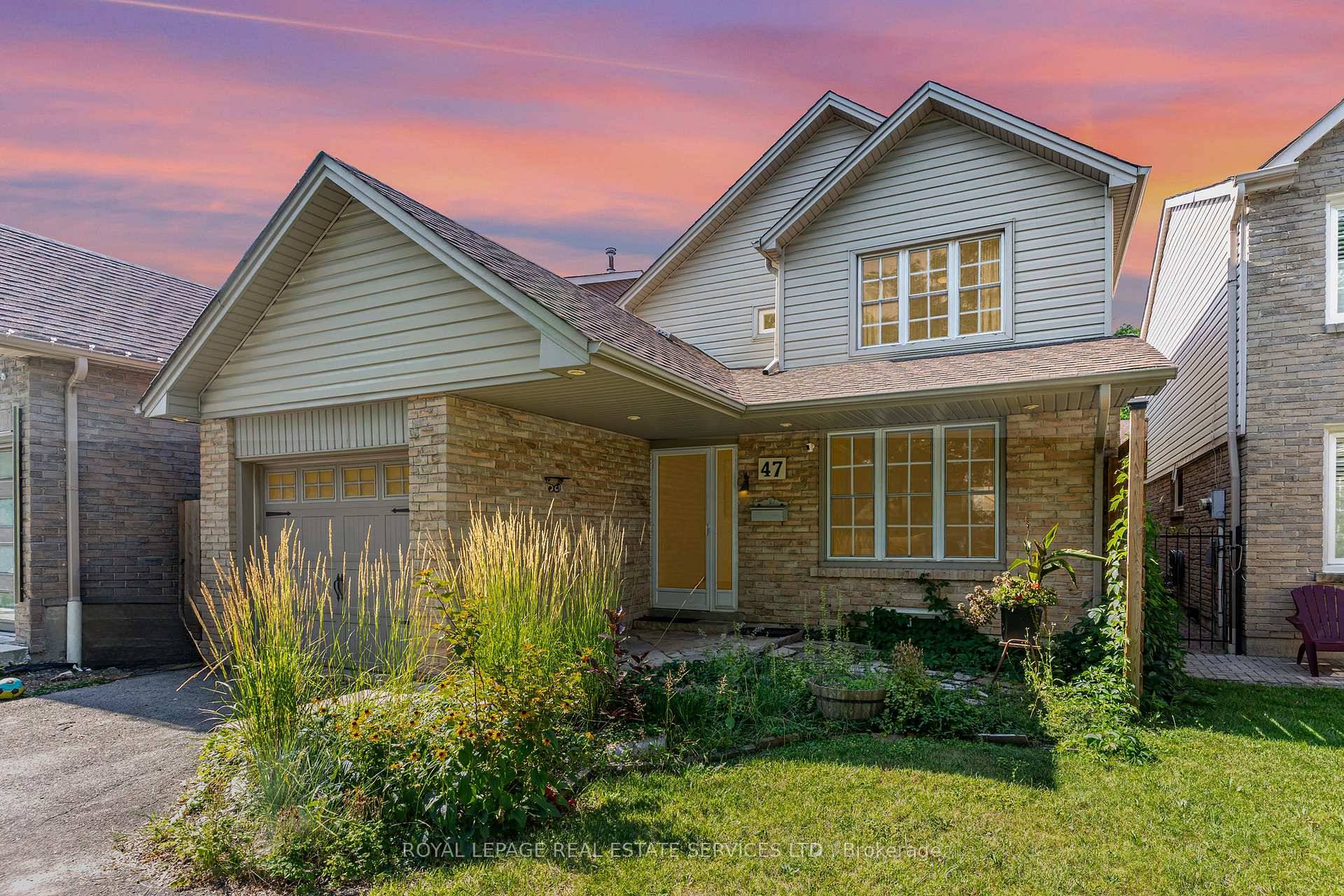 This charming three bedroom home has an updated kitchen that not only boasts modern features and ample space but also offers delightful views of the lovely rear yard.