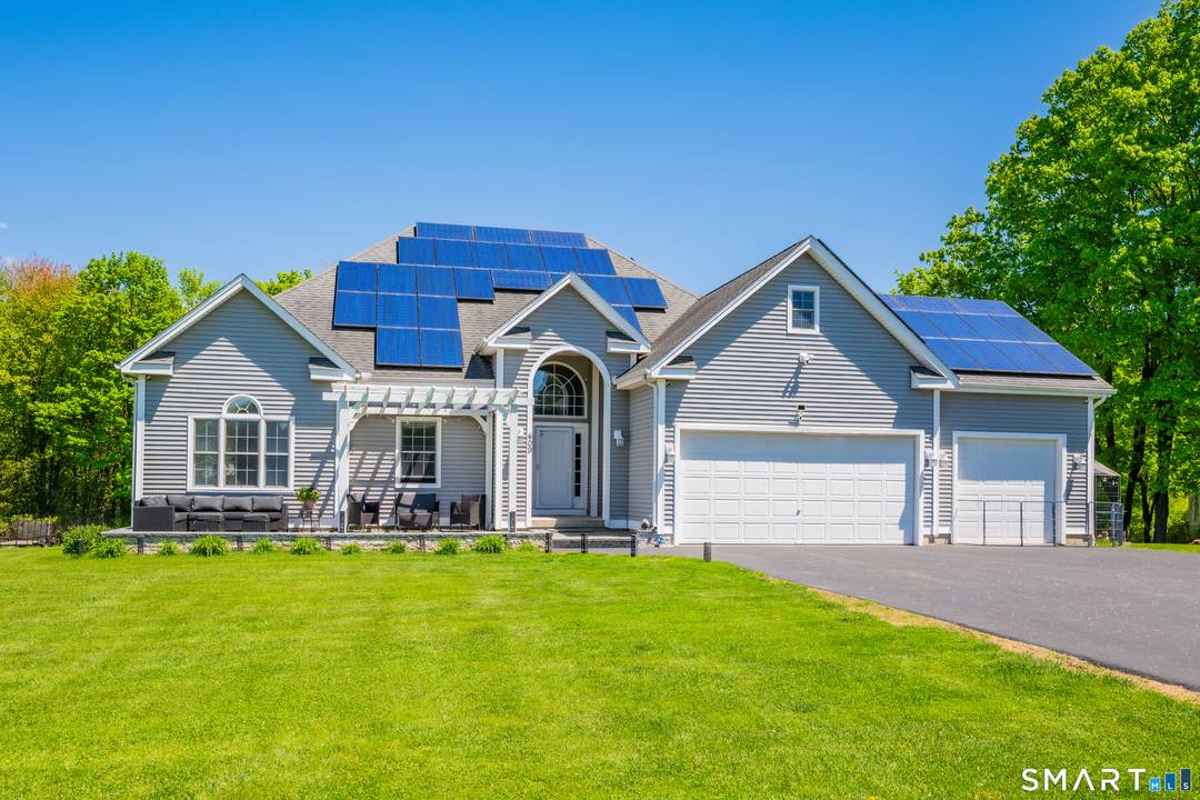 Welcome to 409 Beckley Rd, Berlin a beautifully maintained custom home offering exceptional space, comfort, and privacy on nearly 2 acres backing to peaceful woods.