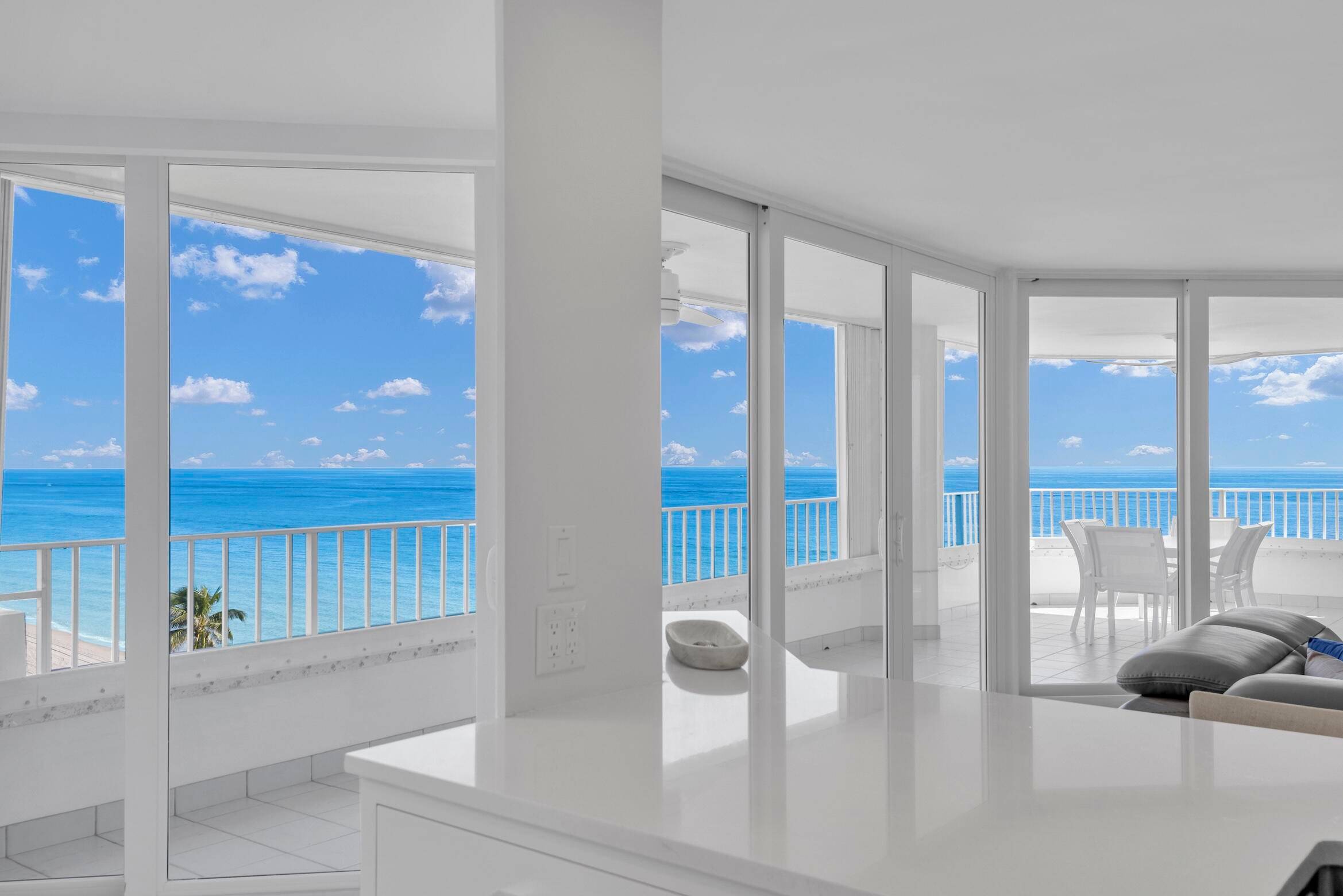 This stunning 8th floor corner residence offers unrivaled panoramic views of Boca Raton's pristine coastline.