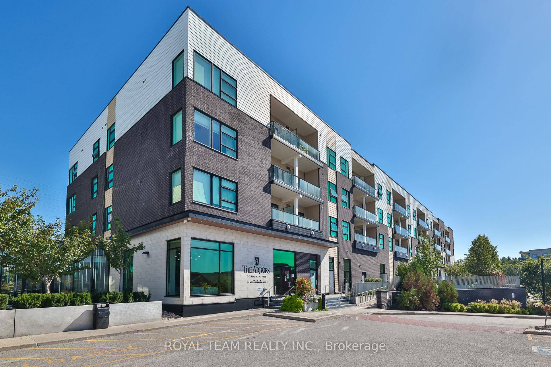 This stunning 3rd floor corner unit offers serene forest views from every window and a spacious, light filled layout.