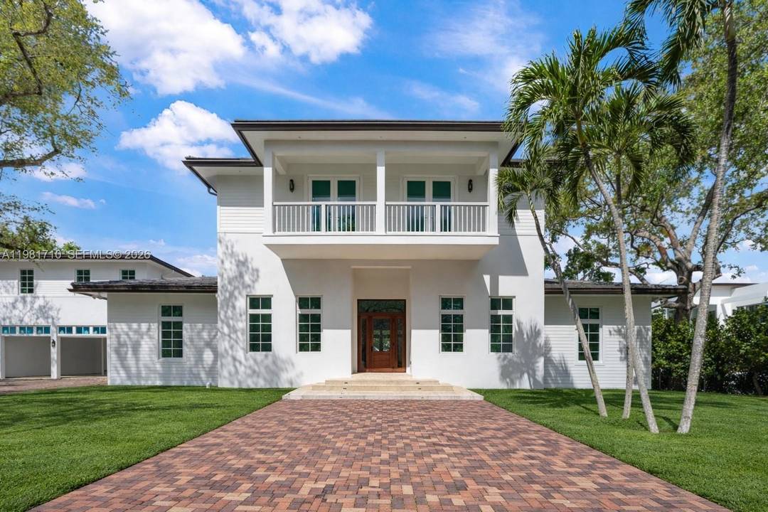 Experience elevated coastal living in the heart of Palmetto Bay.