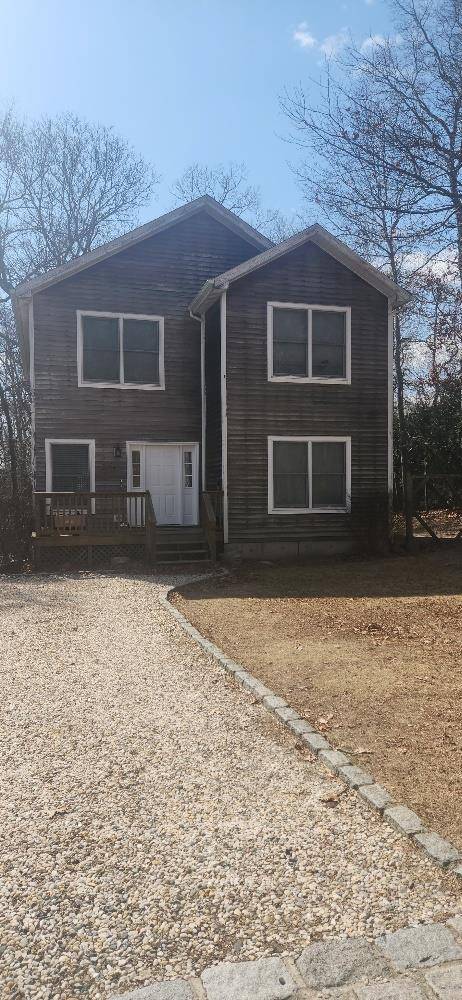 Charming Colonial featuring spacious rooms and a wide open floor plan.