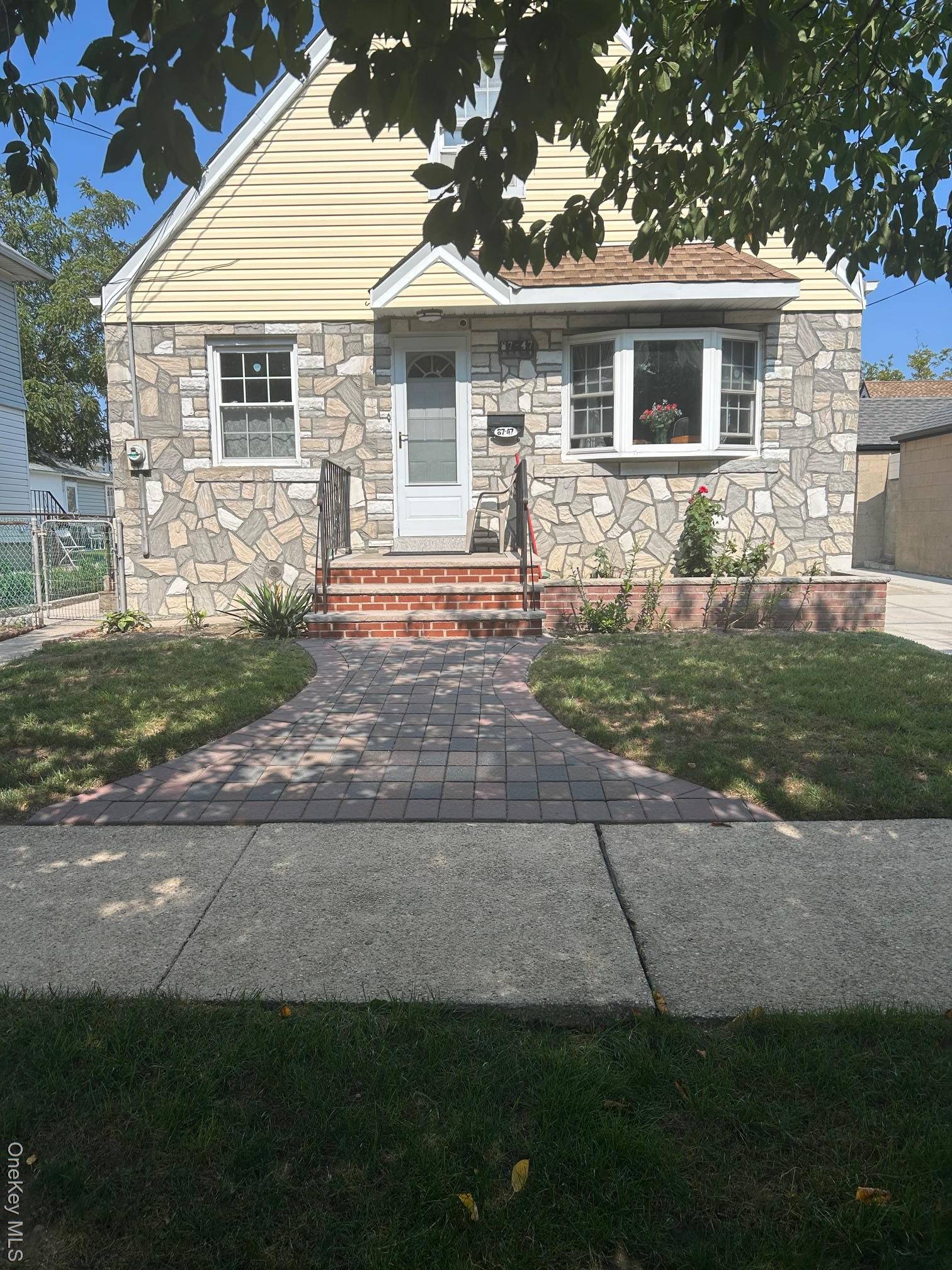 Nestled in the charming community of Floral Park, this inviting Cape Cod home offers 4 bedrooms and 3 full bathrooms, blending classic design with modern comfort.