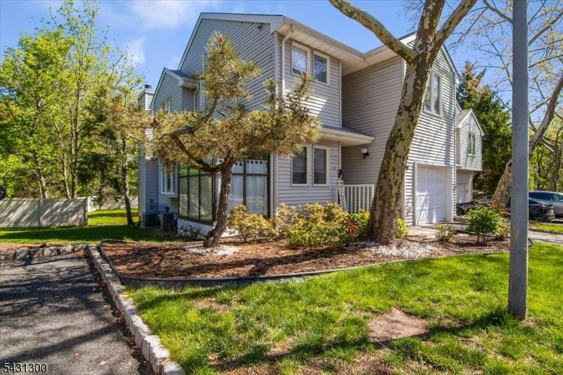 This two bedroom, three full baths, End Unit townhome is ideally located to the complex open area land.