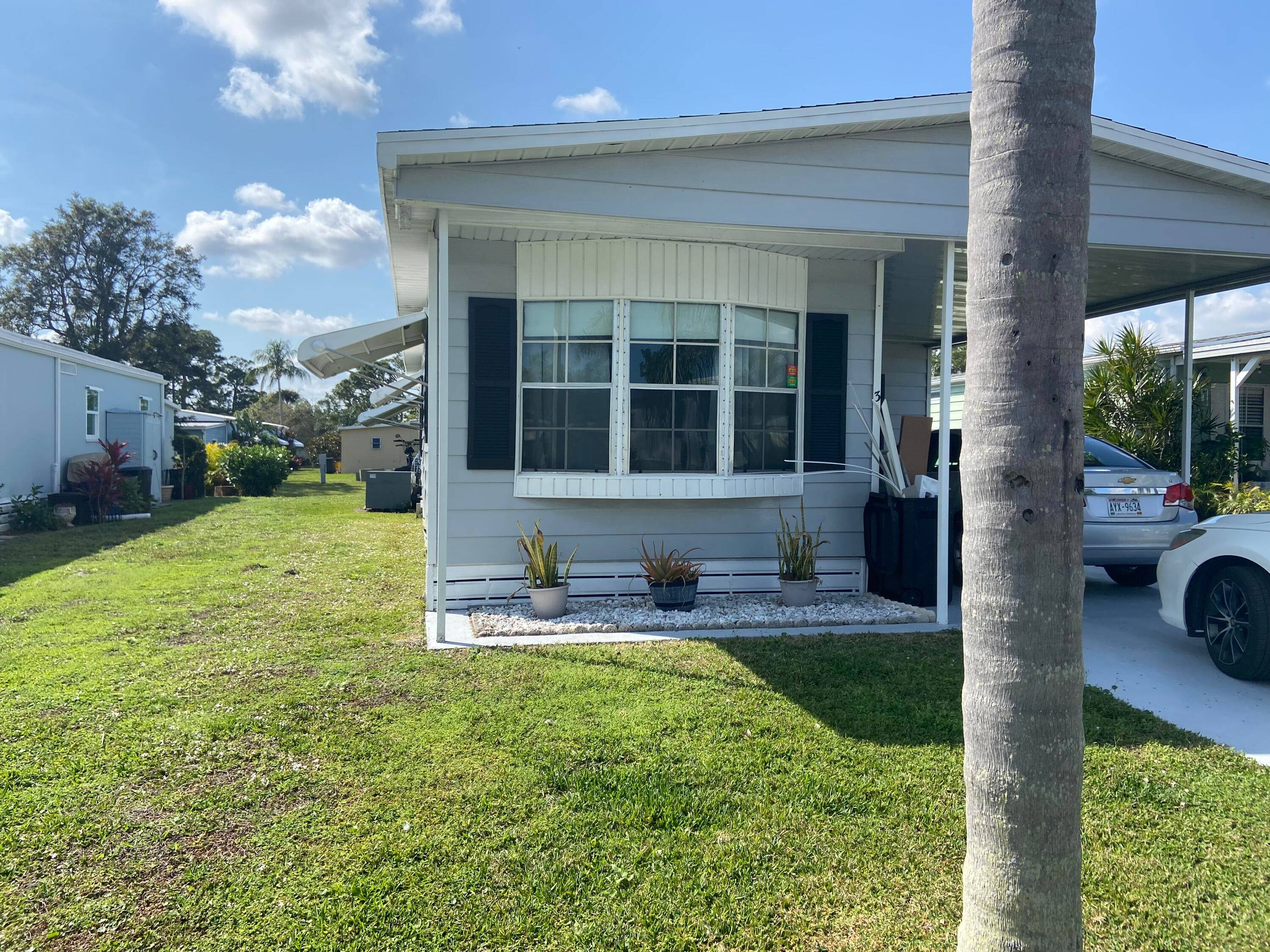 HUGE PRICE REDUCTION ! This 2bd 2 bath home with den overlooking a canal is being offered fully furnished, TURNKEY !