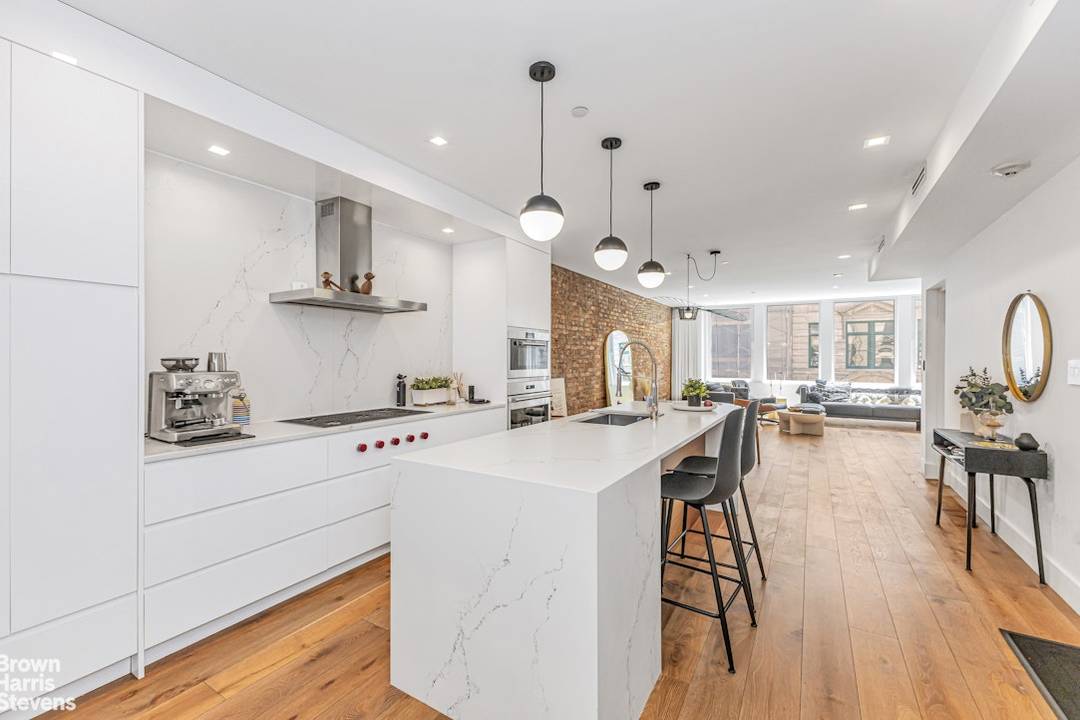 Full floor loft living meets modern luxury in this impeccably renovated two bedroom, two bathroom residence just off Union Square.