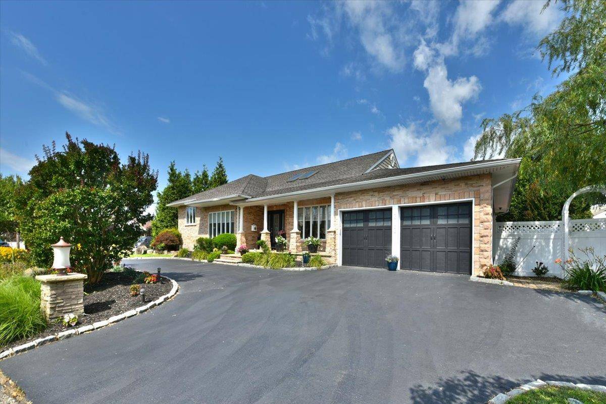 Spectacular Expanded Multi Level Ranch in the Heart of South Massapequa Park Unique one of a kind home offering expansive living space and luxurious details throughout including crown moldings and ...