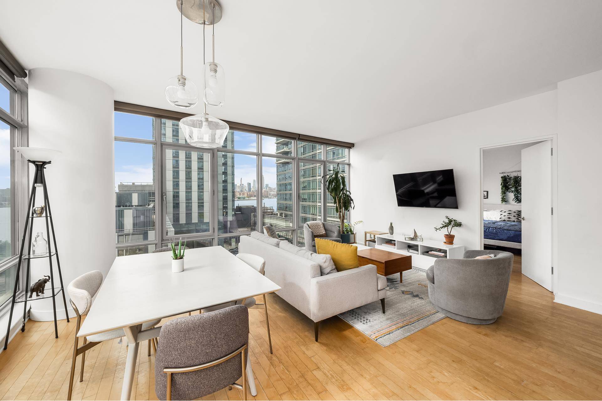 Welcome to 5D ! This stunning two bedroom, two bathroom apartment at 1 Northside Piers offers sweeping panoramic views of the East River and Manhattan including the Empire State Building.