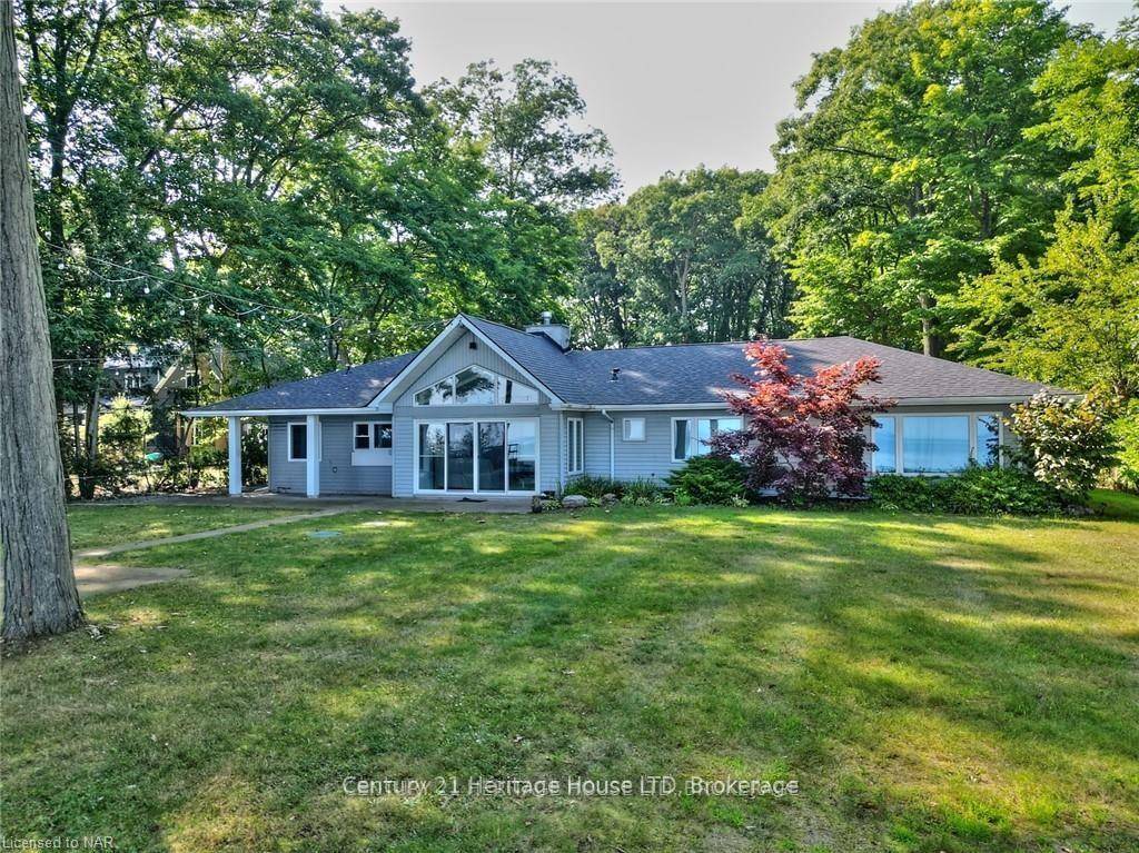 Investors, take note ! REMODELLED LAKE ERIE WATERFRONT HOME with a detached second dwelling guest bunkie on the sandy shores of Lake Erie in Cedar Bay near Sherkston Shores !