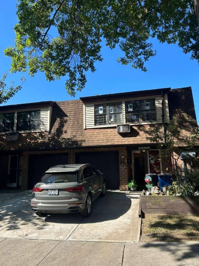 WELCOME HOME TO THIS AMAZING LEGAL 2 FAMILY TOWNHOME CONDO.