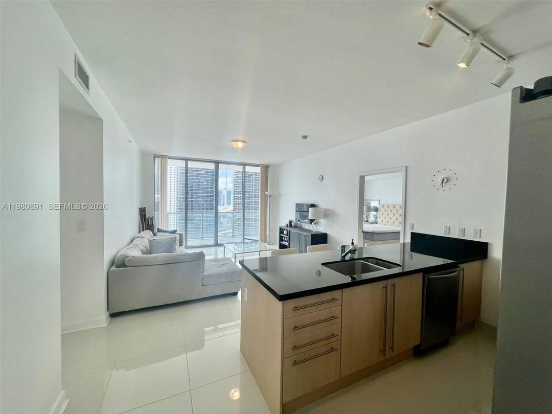 Fully Furnished and Equipped Turnkey High floor 2 bedroom 2 bathroom condo with Beautiful Panoramic Miami City View and Tile Floors throughout.