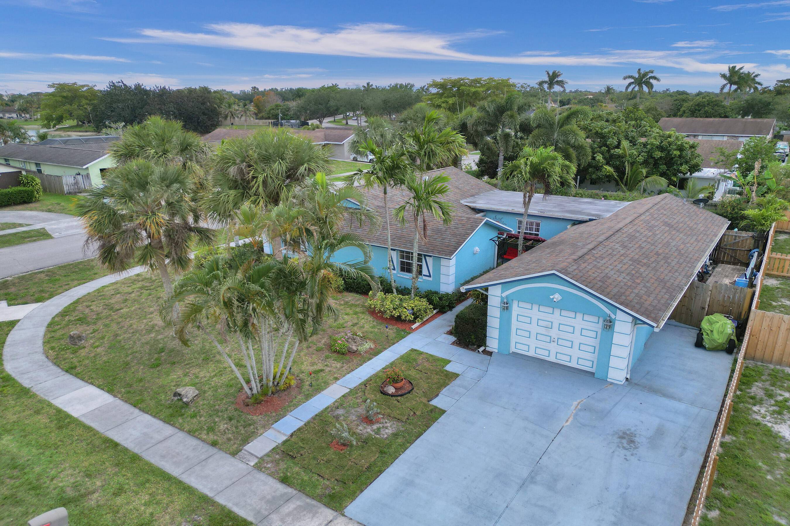 3 Bed Den 3 Bath Private Pool Corner Lot No HOA Royal Palm Beach This is the one you've been waiting for !