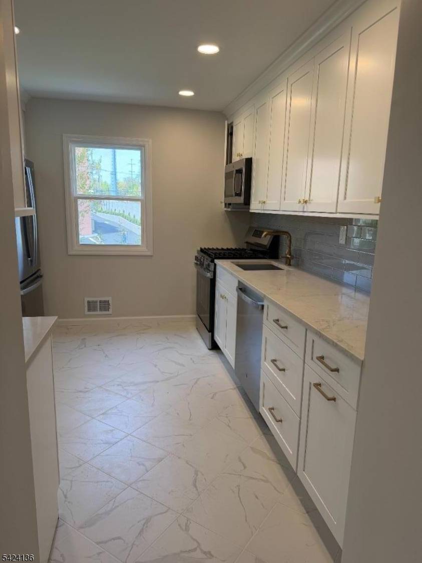 Welcome to this beautifully updated 3 bedroom, 1.