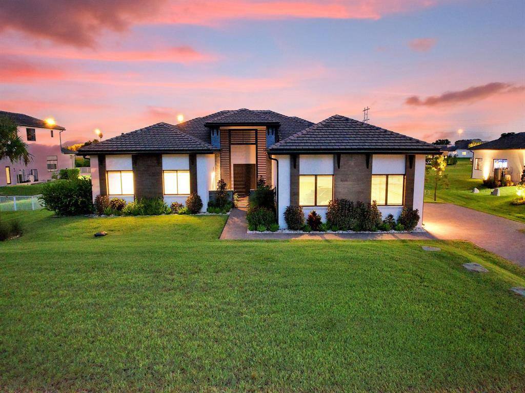 Experience modern elegance in this 2022 built contemporary estate, perfectly positioned on one of the largest Cul de Sacs in Circle S Estates.